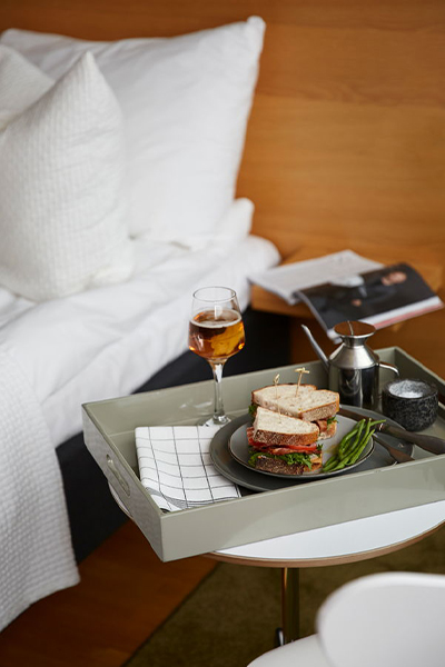 Towel napkin on a room service tray in a hotel room